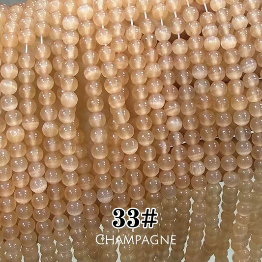 Cat's Eye Round Beads 15" Strand 33# (Champagne)