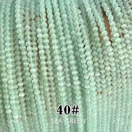 Cat's Eye Round Beads 15" Strand 40# (Sea Green)