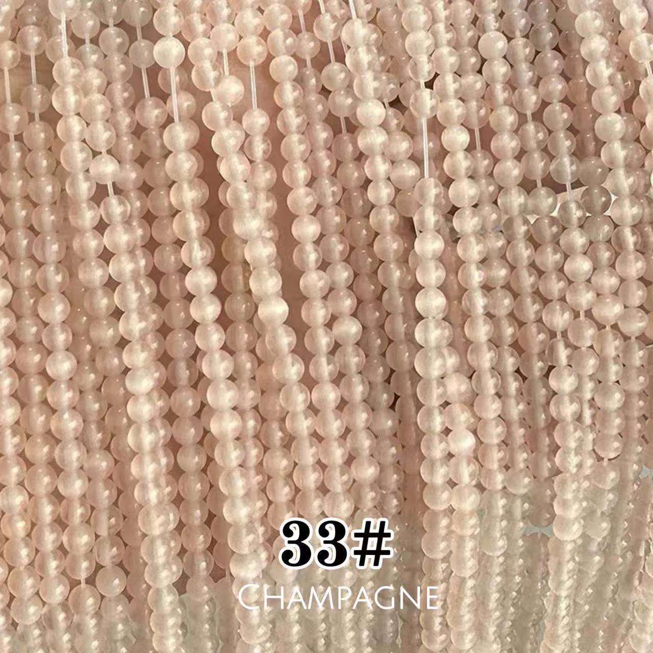 Cat's Eye Round Beads 15" Strand 33# (Champagne)